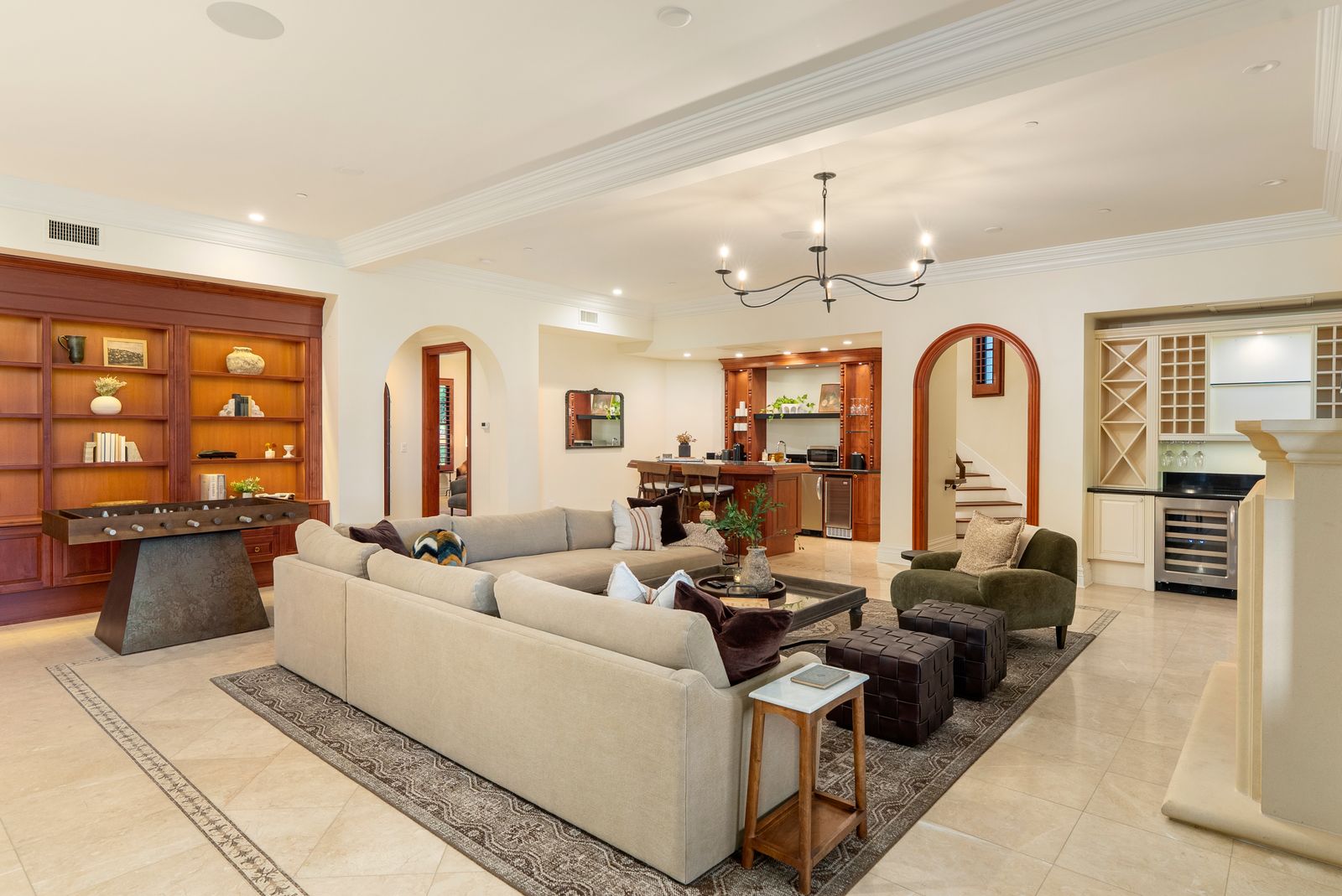 Wide view of the East Villa downstairs living room and library