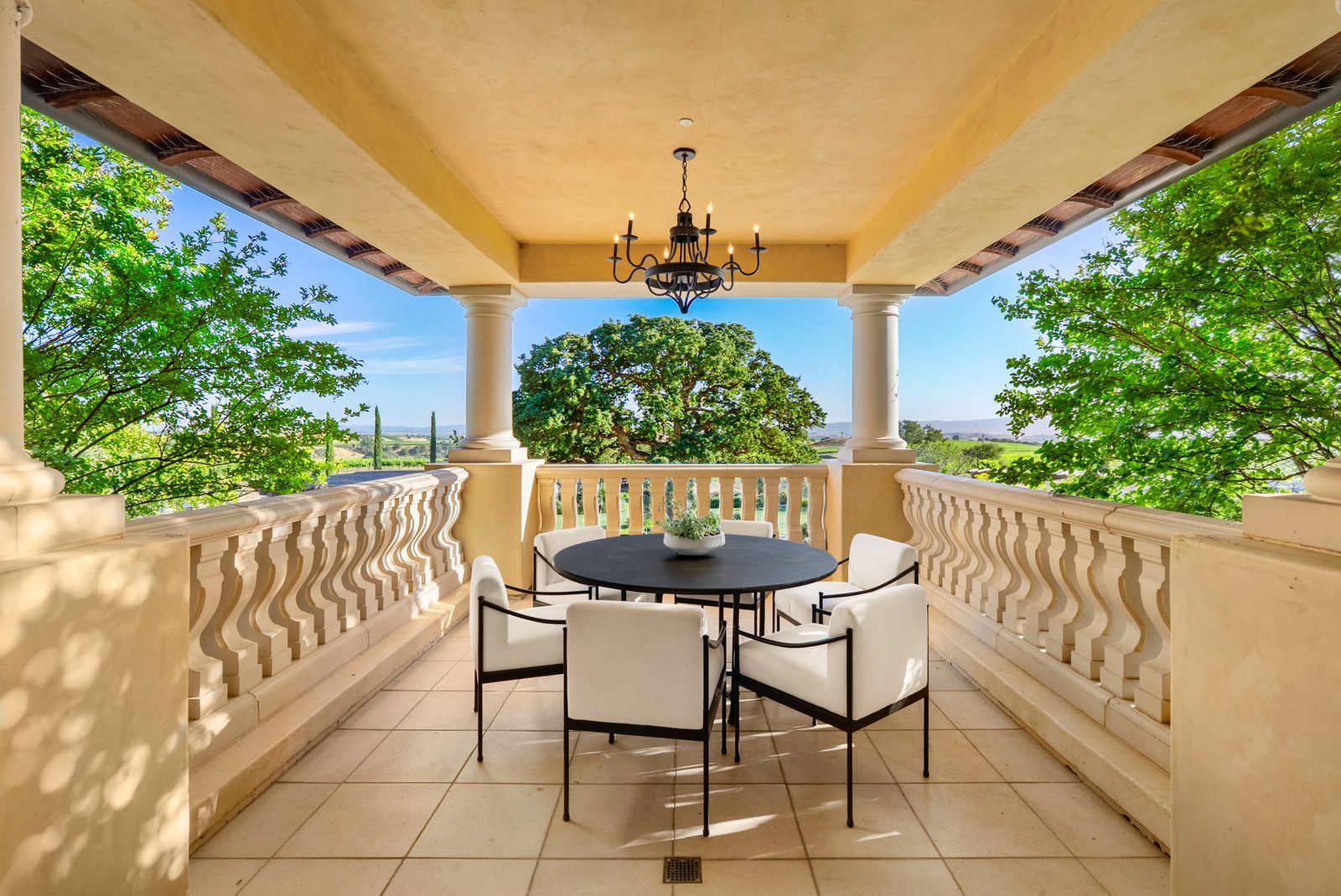 Covered veranda seating at Villa San-Juliette